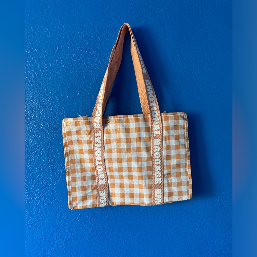 Manrepeller emotional baggage checkered tote